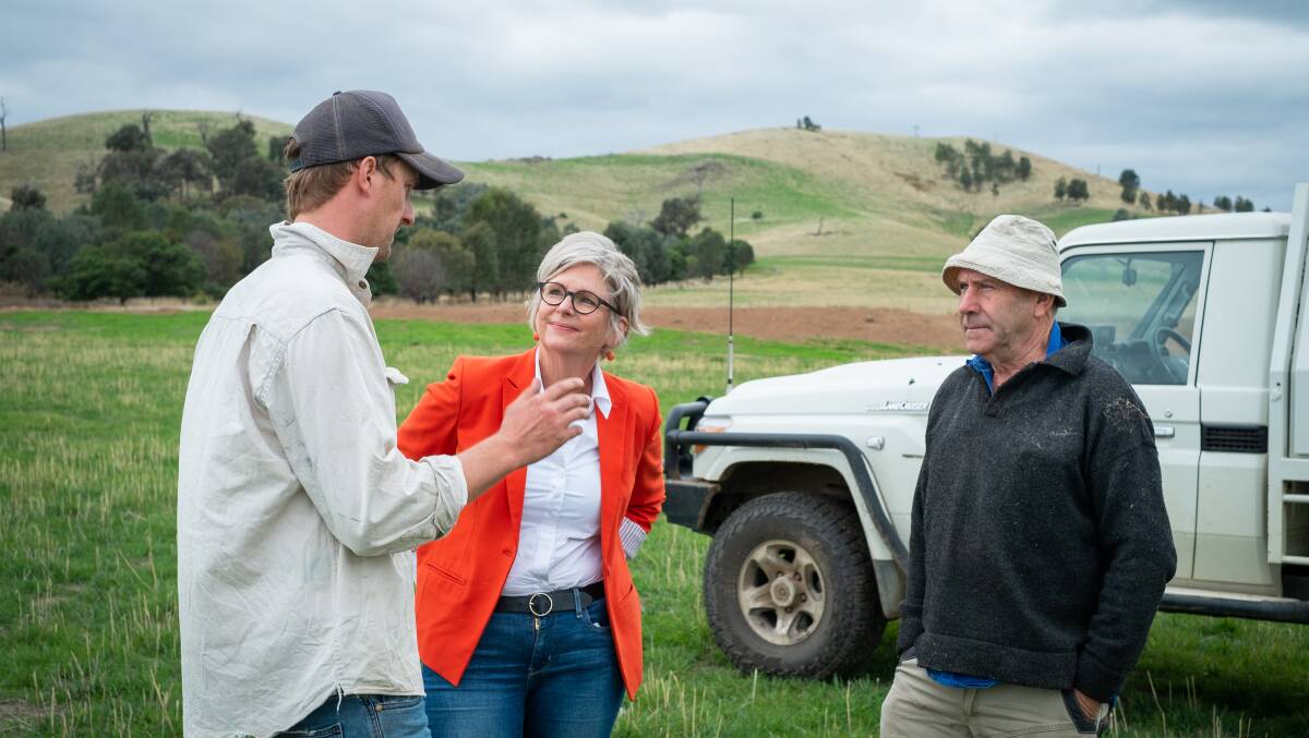 Helen Haines in Euroa when she launched her policy to provide further extension officers with Euroa sheep farmers Ed Mercer (left) and Simon Edwards (right). Picture supplied