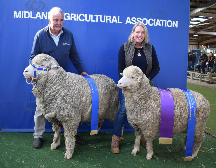 Stud classer Andrew Calvert with Trefusis Poll Ram 210106 and Trefusis stud principal Georgina Wallace with the Supreme Ewe 210164. Picture by Nicole Ruff