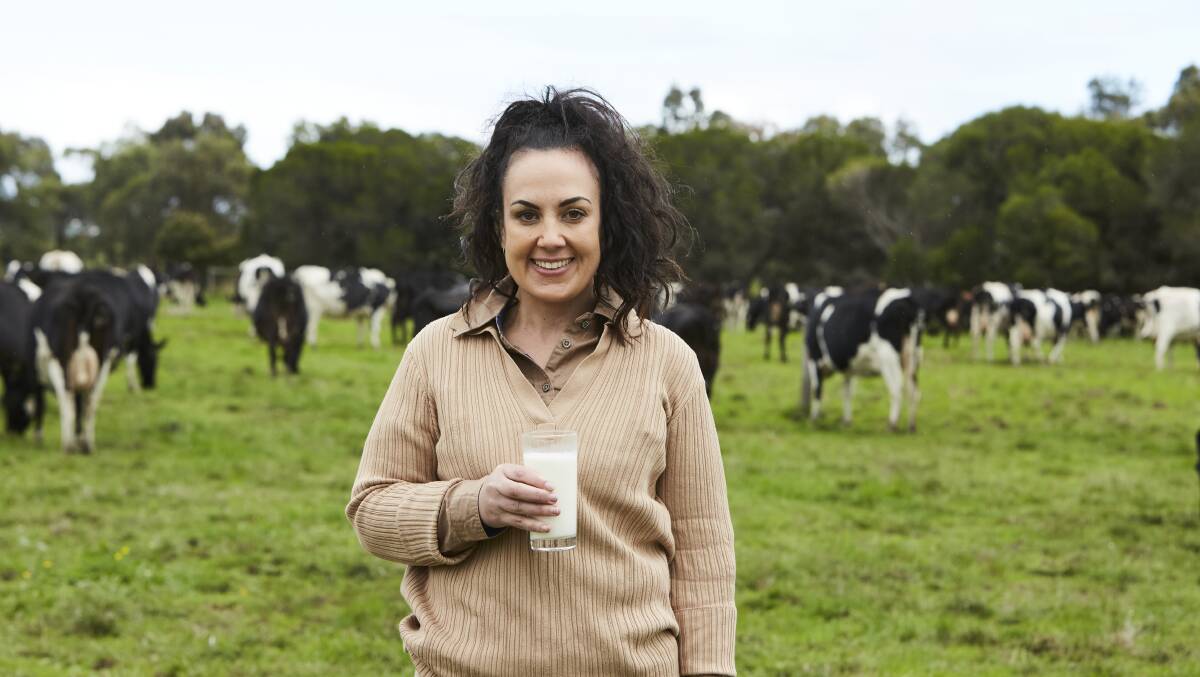Sarah Kelly runs what might be one of the closest dairy farms to Melbourne's central business district, with father Gerry. Picture supplied by Dairy Australia