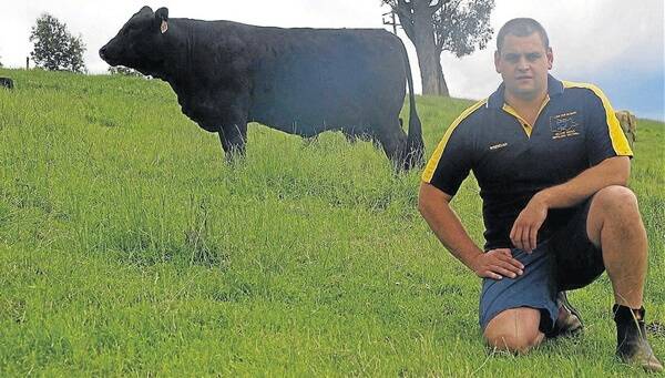 Brendan Fulton, Lone Pine, Willow Grove, pictured with one of his 7/8 bred Black d’Aquitaine heifers, will be the first breeder in Australia to sell pure Black d’Aquitaine cattle.