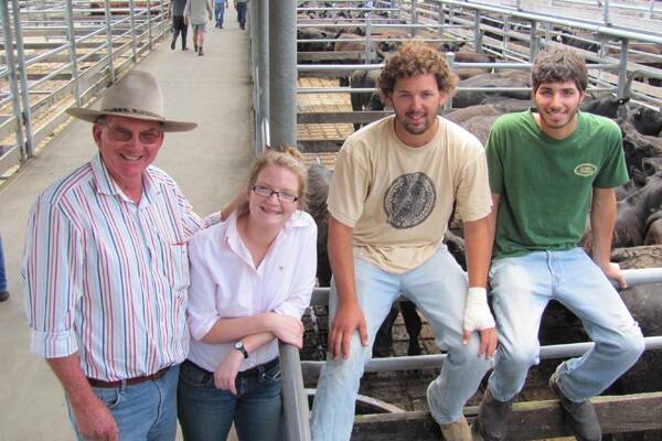 Wayne Durnan (left), Widgiewa Station, Morundah, NSW, cleared 360 Angus steers and heifers to $775 or 260c/kg at Wodonga Friday. He is pictured with daughter Erin, and Israeli farmhands Ofer Mizrahi and Guy Jordan. The boys have been working in Australia for three months and are from a Middle Eastern Kibbutz, a communal farm.
