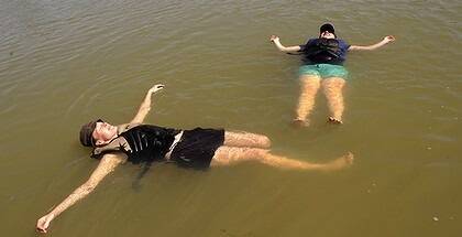 Roanna Cranstourn and Robyn Haig escape the heat in The Murray River at Mildura. Photo: Pat Scala
