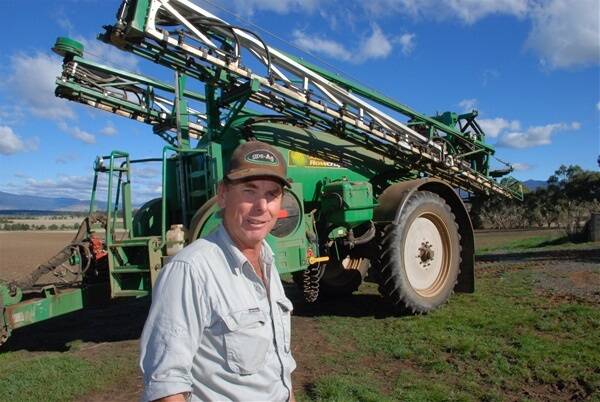 Cressy farmers Andrew Bond with his Gold Acres advance rowcrop sprayer with Smart Steer. 