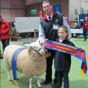 Jamie Buerckner and daughter Hayley, Bauer stud, Ariah Park, NSW, with their champion ewe exhibit. 