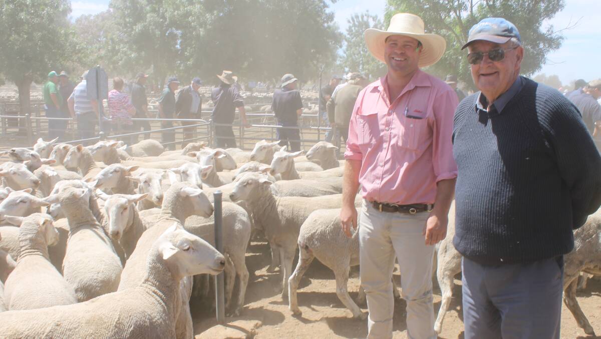 LAST HOORAH: Ken Bibby, Carrum with his Elders Warracknabeal agent, Arron Zwar, topped Wycheproof sale with crossbred young ewes bought last spring as lambs for $200 and sold Friday at $322 in his last sale before retiring.  
